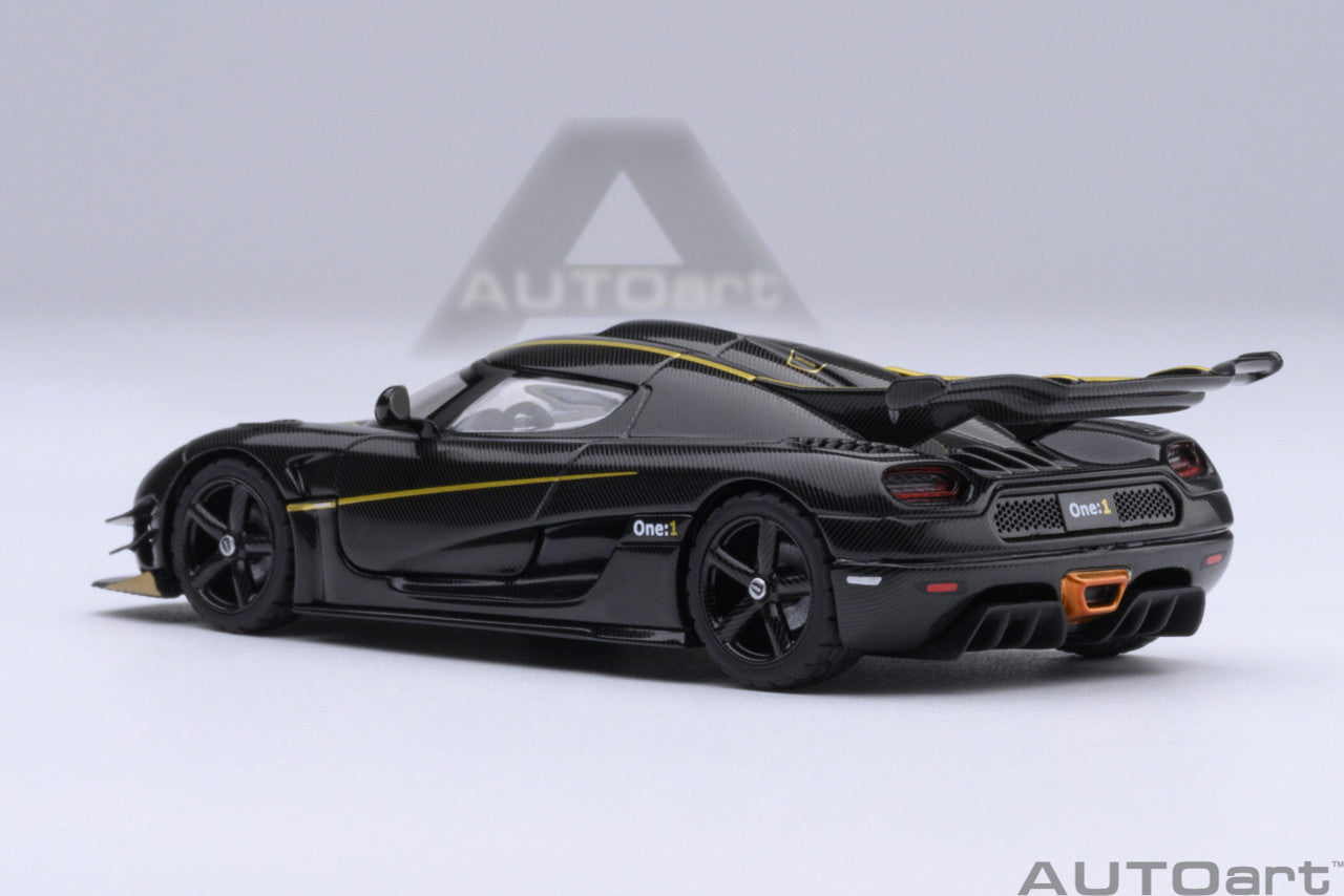 1:64 Koenigsegg One: 1 Clear Carbon Fibre/Gold Stripes - AutoArt 20043