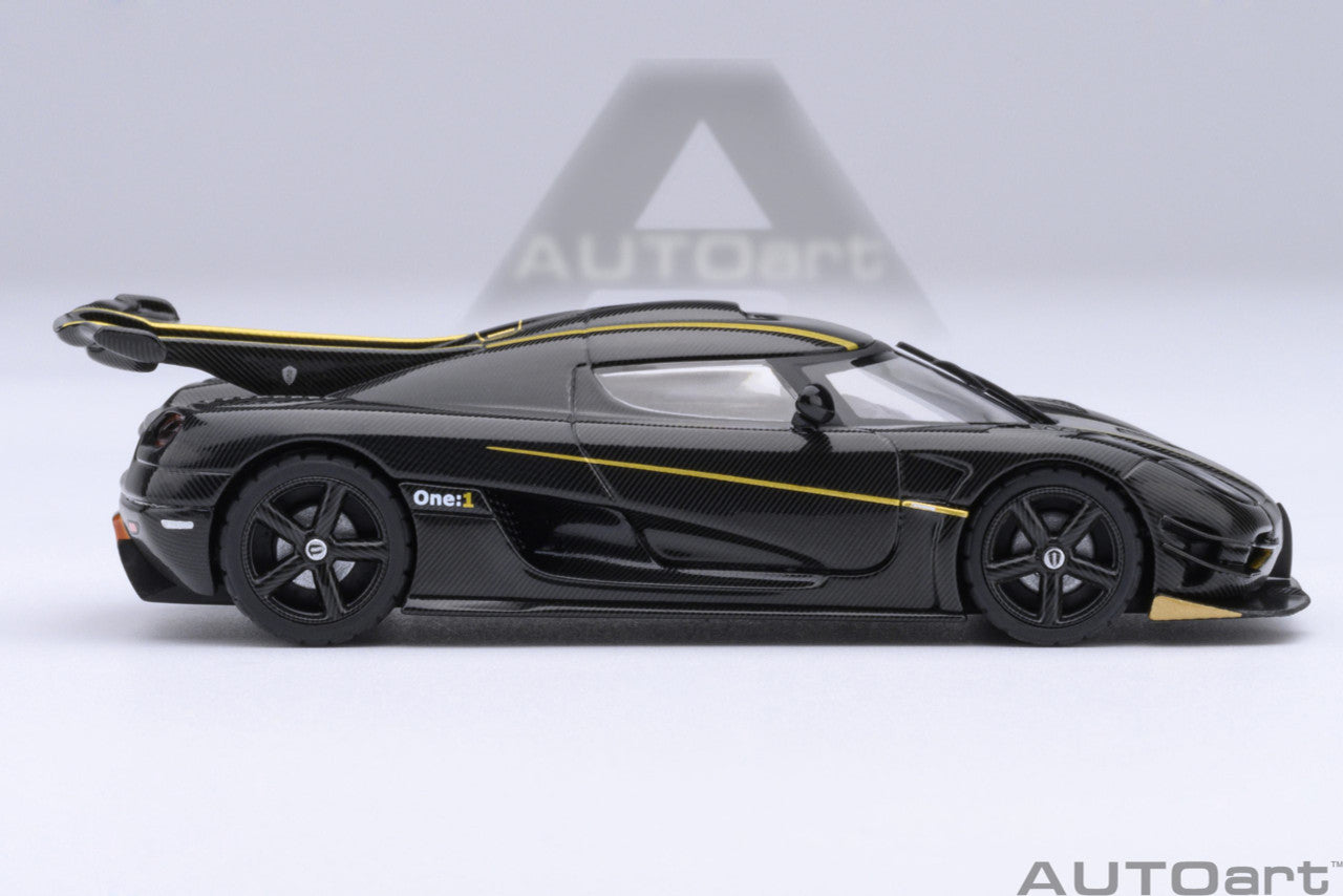 1:64 Koenigsegg One: 1 Clear Carbon Fibre/Gold Stripes - AutoArt 20043