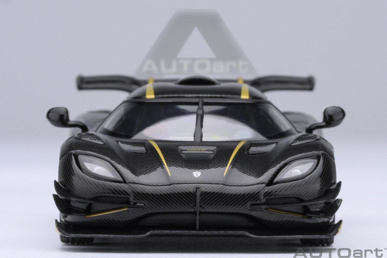 1:64 Koenigsegg One: 1 Clear Carbon Fibre/Gold Stripes - AutoArt 20043
