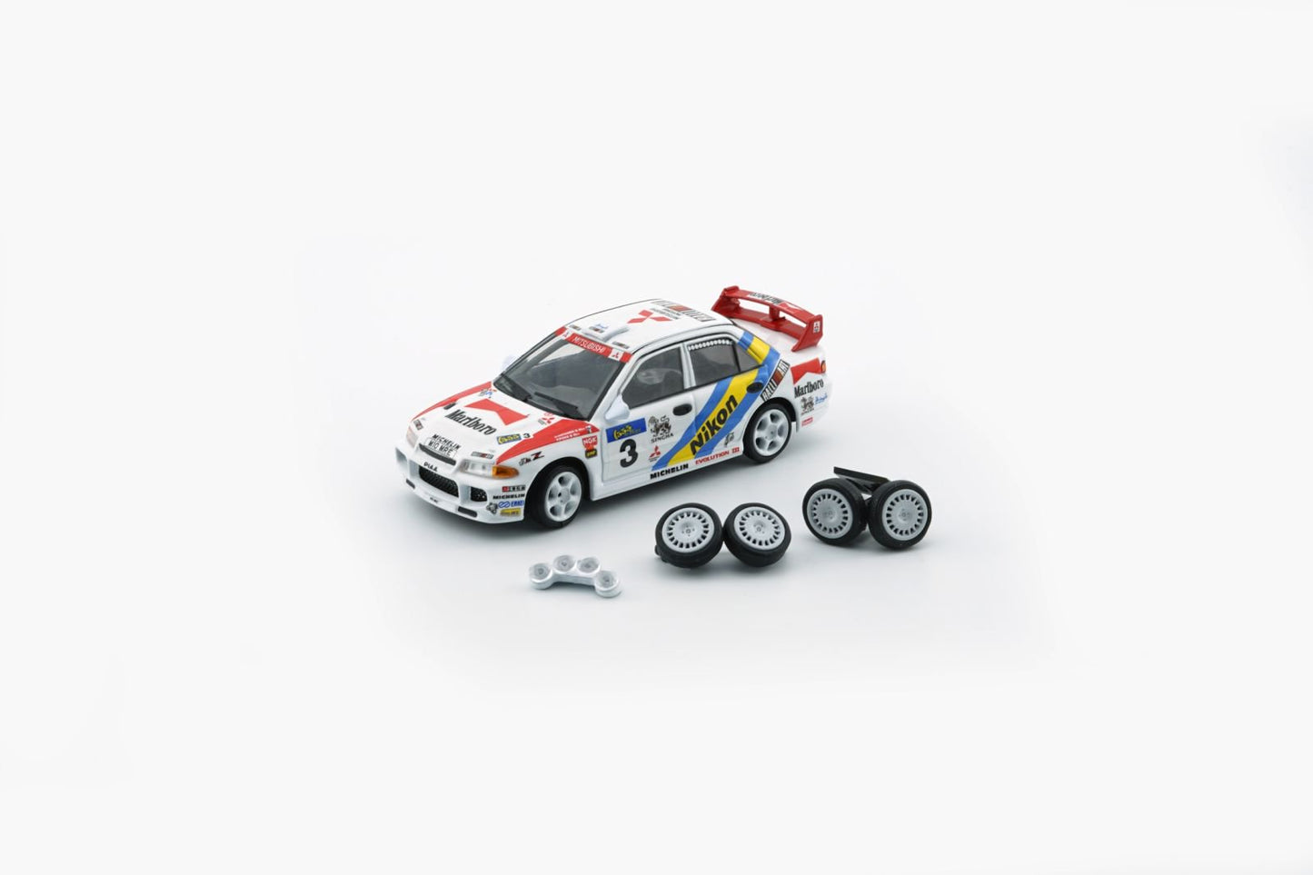 1/64 Mitsubishi Lancer EVO III (LHD) Hong Kong Beijin Rally 1995 #3 NIKON - 64B0224