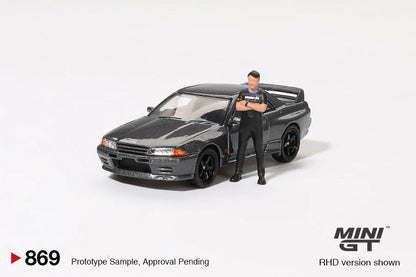 1/64 NISSAN SKYLINE GT-R (R32) NISMO GUNMETAL WITH MATSUDA FIGURE 1/64 NISSAN SKYLINE GT-R (R32) NISMO GUNMETAL WITH MATSUDA FIGURE