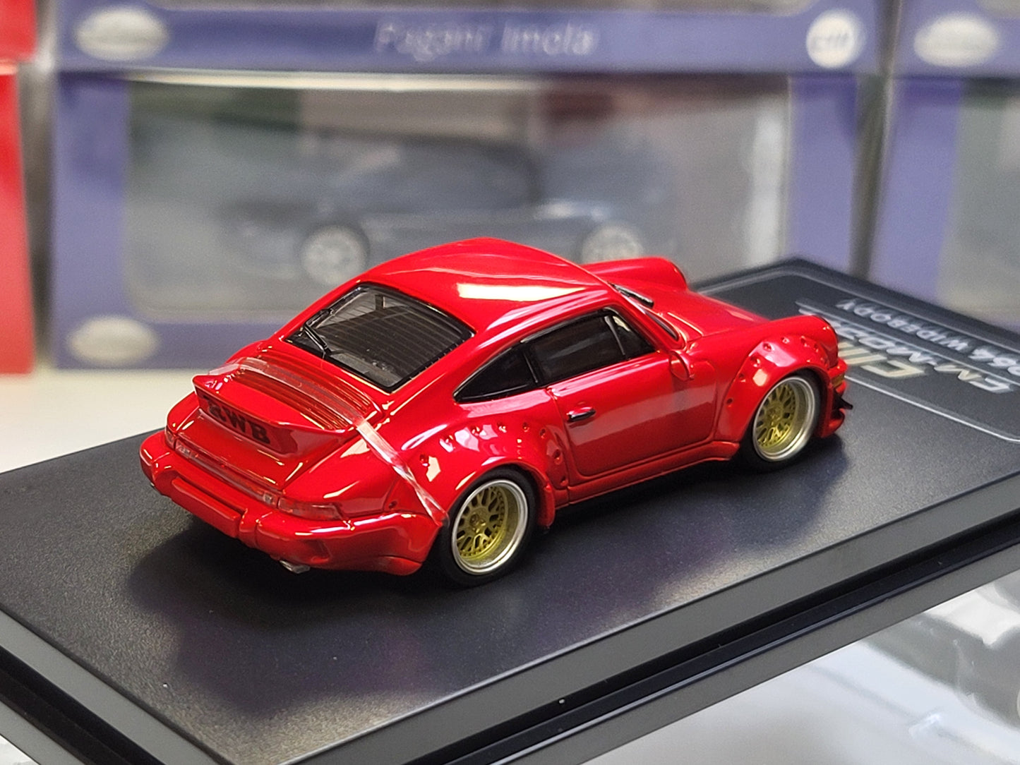 1/64 - PORSCHE - 911 964 RWB RAUH-WELT COUPE WITH RACING SET WHEELS AND WING 1987 - RED- CM Models