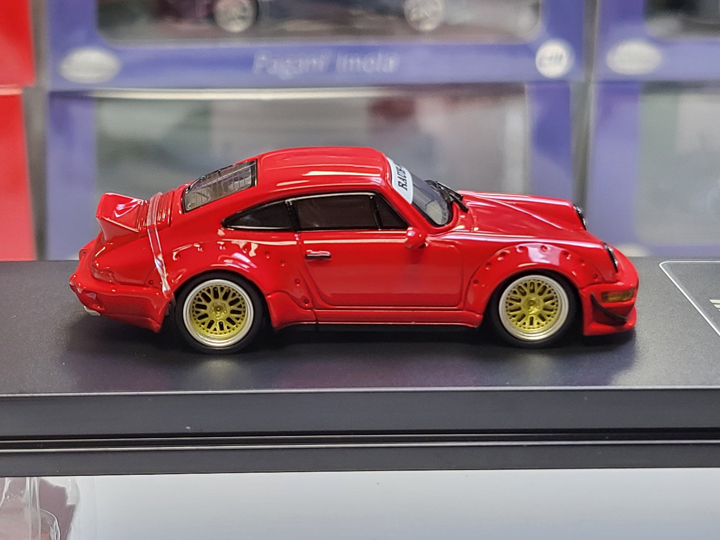 1/64 - PORSCHE - 911 964 RWB RAUH-WELT COUPE WITH RACING SET WHEELS AND WING 1987 - RED- CM Models