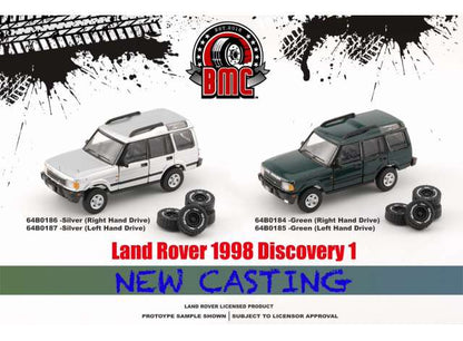 1/64 1998 Land Rover Discovery 1, silver right hand drive with an extra set of off road tires - BM64B0186rhd