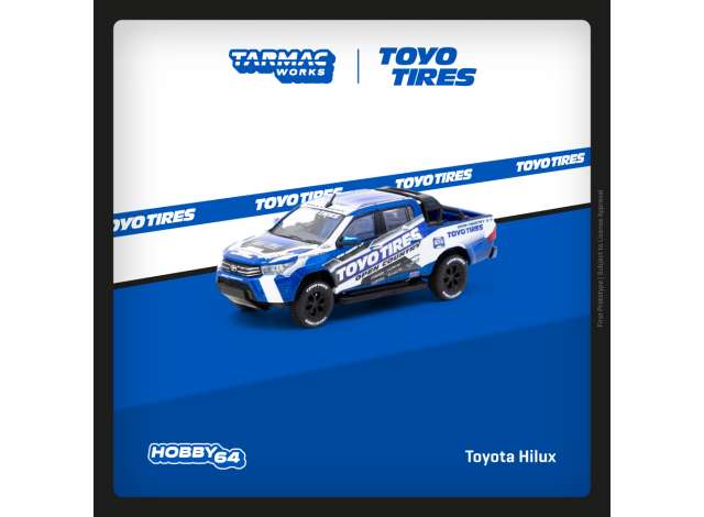 1:64 Toyota Hilux *Toyo Tires*, blue/white - TC-T64-041-TOYO