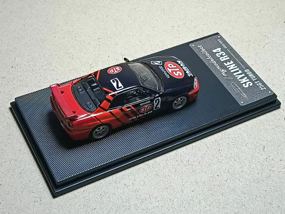 1/64 Nissan Skyline R34 25GT Turbo STP - Advan Livery - Model Collect