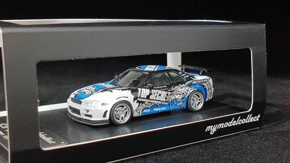 1:64 Nissan Skyline R34 V-Spec - Top Secret White - Model Collect