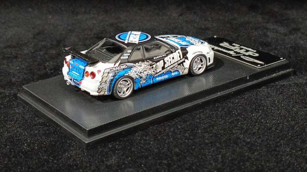 1:64 Nissan Skyline R34 V-Spec - Top Secret White - Model Collect