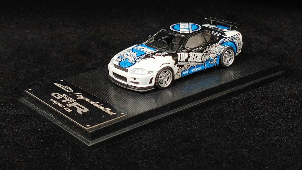 1:64 Nissan Skyline R34 V-Spec - Top Secret White - Model Collect