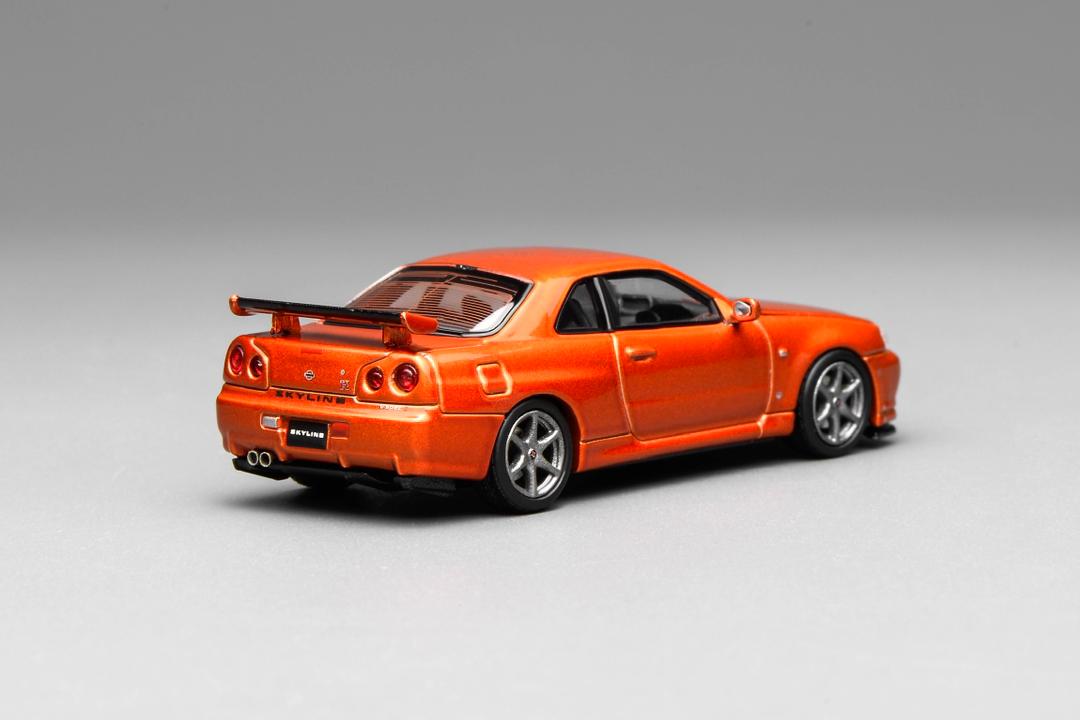 1/64 NISSAN - SKYLINE GT-R (R34) V-SPEC II COUPE 1999 - ORANGE MET - Motorhelix - M63471