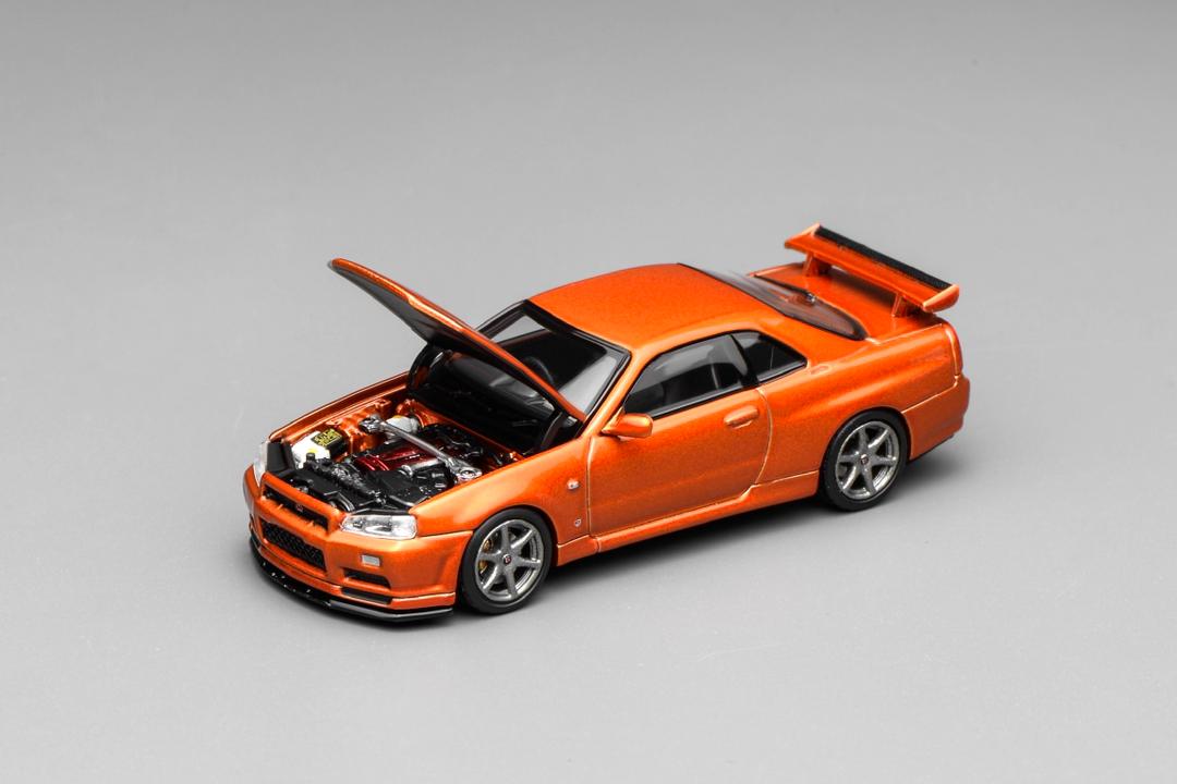 1/64 NISSAN - SKYLINE GT-R (R34) V-SPEC II COUPE 1999 - ORANGE MET - Motorhelix - M63471